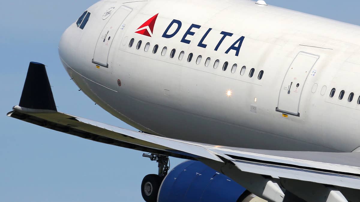 A 61-year-old Delta Airlines pilot was taken into custody and his flight from Edinburgh to New York was canceled.